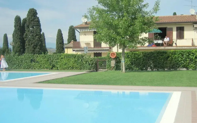 Enticing Holiday Home In Lazise With Swimming Pool