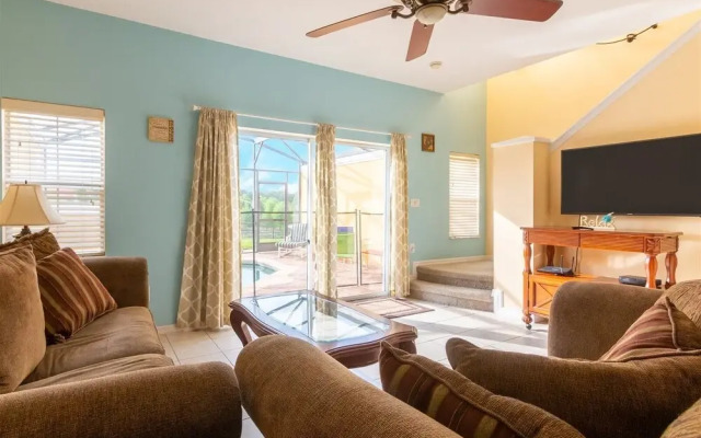 Private Screened Splash Pool Overlooking Tranquil Lake Right Beside Disney World by Florida Dream Homes