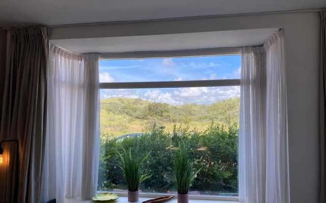 Prachtige woning aan strand zee en duin