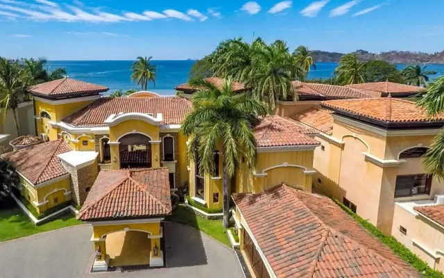 Mediterranean-style Flamingo Mansion Offers the Ultimate in Beachfront Luxury