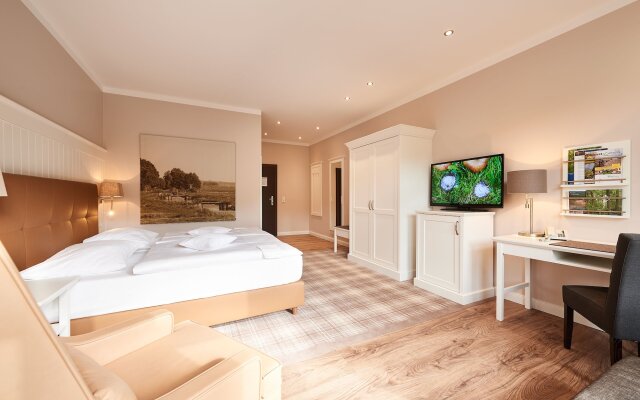 Отель Munte-Wellnesshotel am Stadtwald
