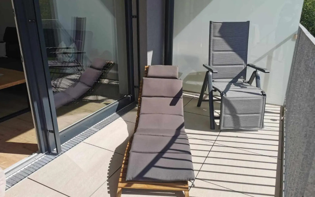 Ferienwohnung Bergsonne mit Sonnenbalkon und Tiefgaragen Parkplatz