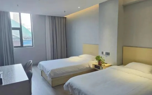 Peach Boutique Hotel (Xinyang Qiansheng Department Store Railway Station) – Guest Rooms – Xinyang