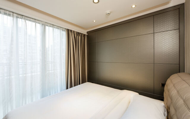 HeeFun Apartment Hotel GZ Poly D Plaza