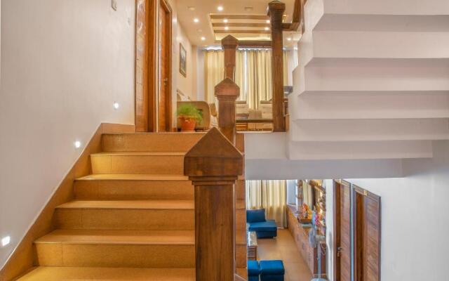 The White Haven Homestay I Rooms & Kitchen