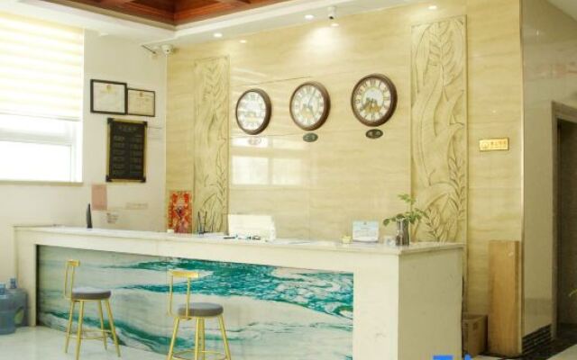 Xinyang New Century Business Hotel