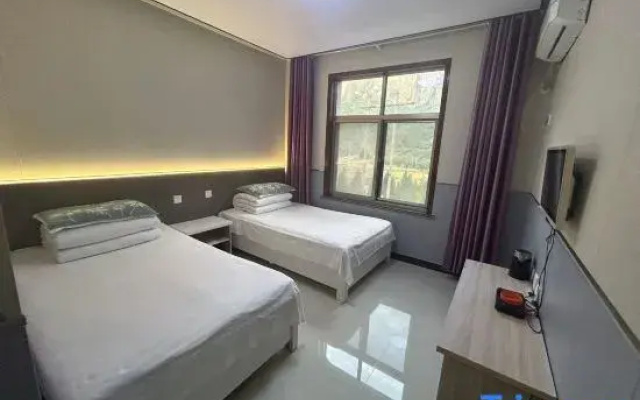 Huguan Xinmeet Hotel
