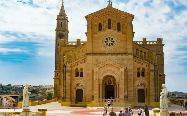 A Pretty Duplex Apartment in a Gozo Village Square