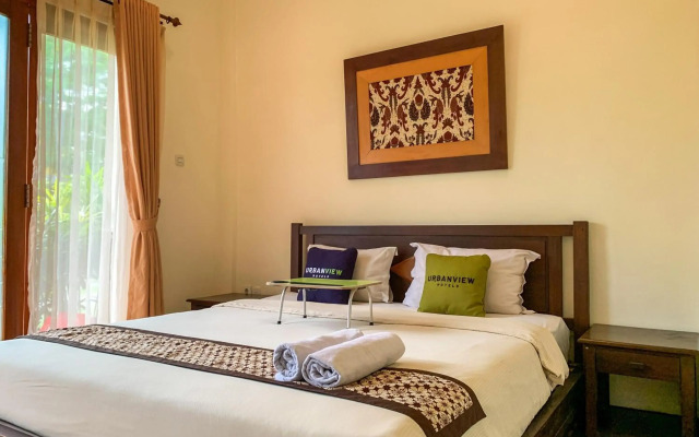 OYO 261 Sasono Putro Guest House