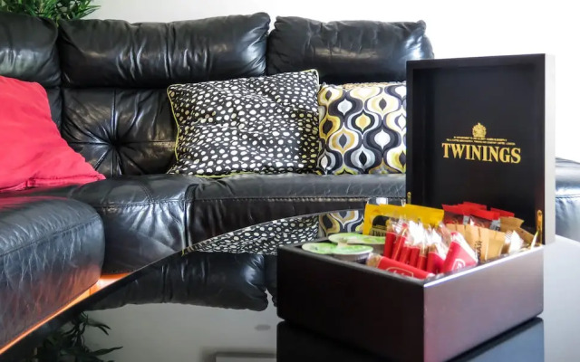 Tudors eSuites Park Central Townhouse Garden and Parking