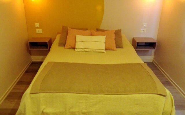 Apart Hotel el Jardin de los Presentes