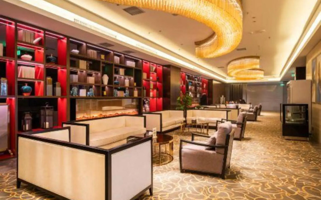 Xinzheng Xingangwanhua Hotel