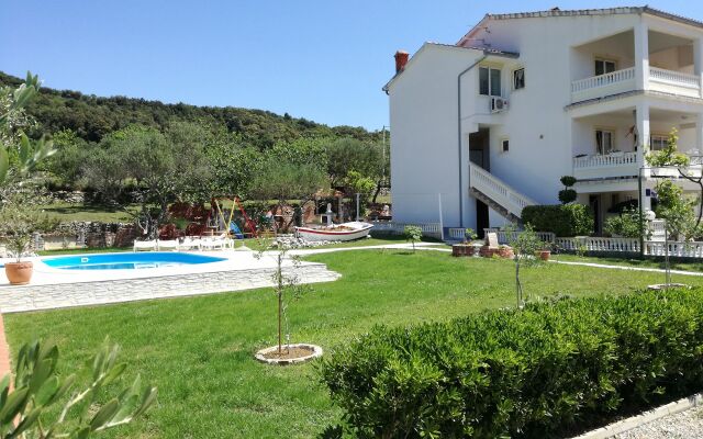 Apartment Robi- swimming pool and beautiful garden A2-crveni Kampor, Island Rab
