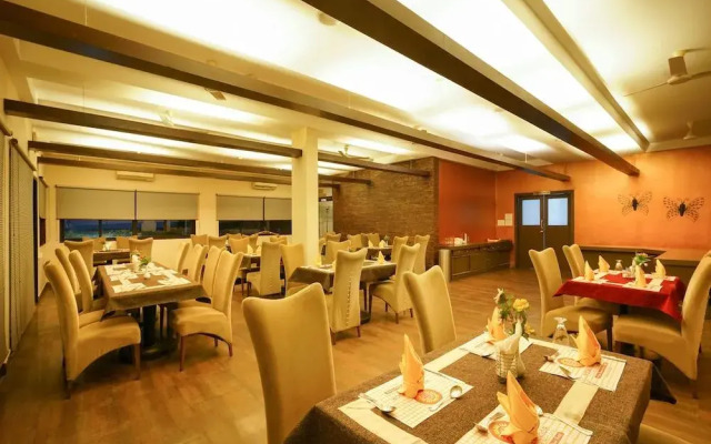 Capital O 15754 Mookkannoor Tourist Home