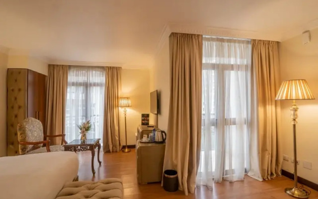 The Grand Palace Suites & Hotel