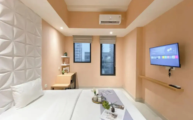 Peach Tone Studio At Evenciio Margonda Apartment