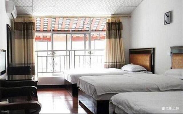 Emeishan Sanyuan Shuzhuang Home Stay