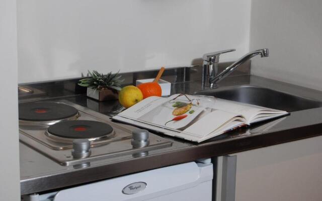 Rio Arriba Suites Apartments y Resto