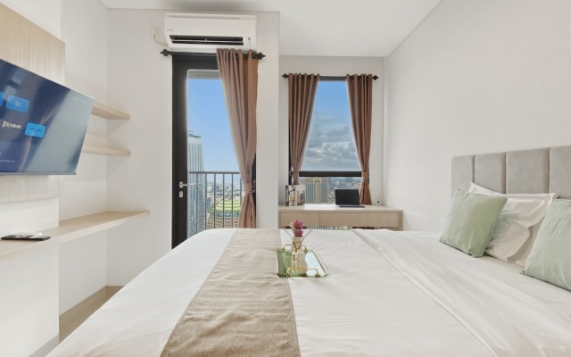 Homey Wooden Touch Studio At Apartment Ciputra World 2 – Guest Rooms – Jakarta
