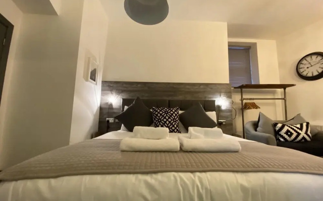 Studio at The Coach House Apartments