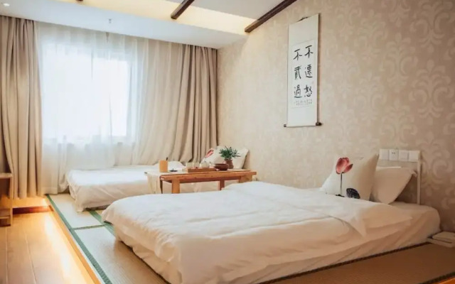 Suzhou Hezizai Inn