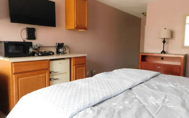 Apm Inn & Suites