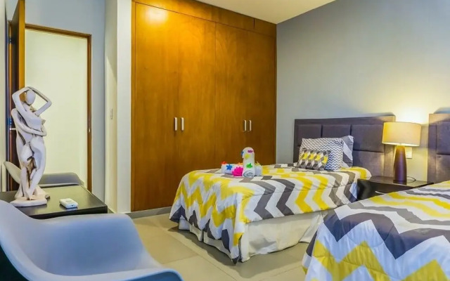 Lunada 314 Modern Playa del Carmen Condo with Tropical Garden View by RedAwning