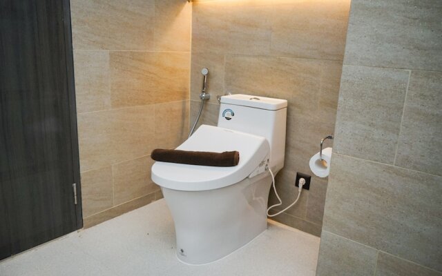 Studio Apartment With Sofa At Carstensz Residence