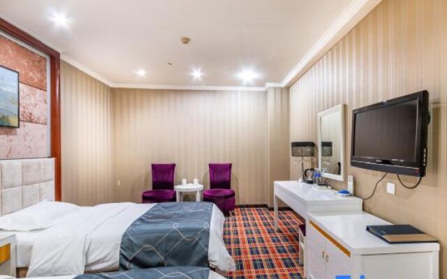 Oupai Jindi Grand Hotel (Xinyang International Trade City East Railway Station)