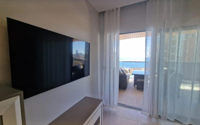 SUNSET WAVES vistas al mar