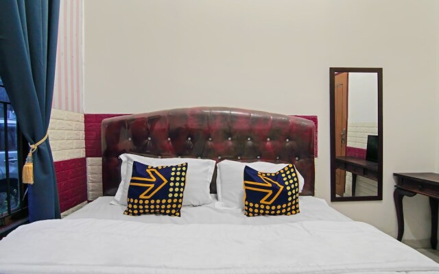 SPOT ON 92570 Putri Guest House Syariah Near SPBU Rimbo Panjang