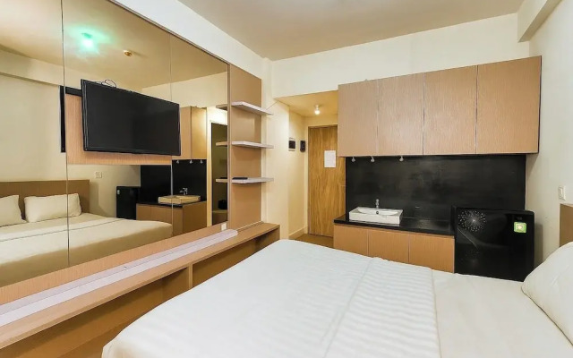 Quintessa Room at Candiland Apartement