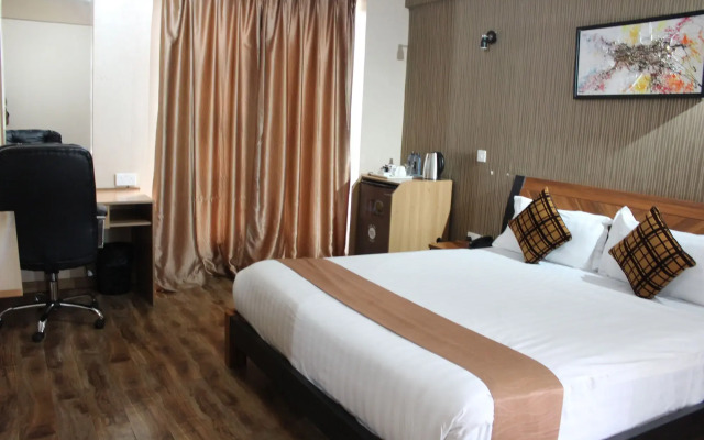WE Hotel and Suites