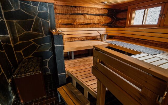 Saarikejo Log Chalet