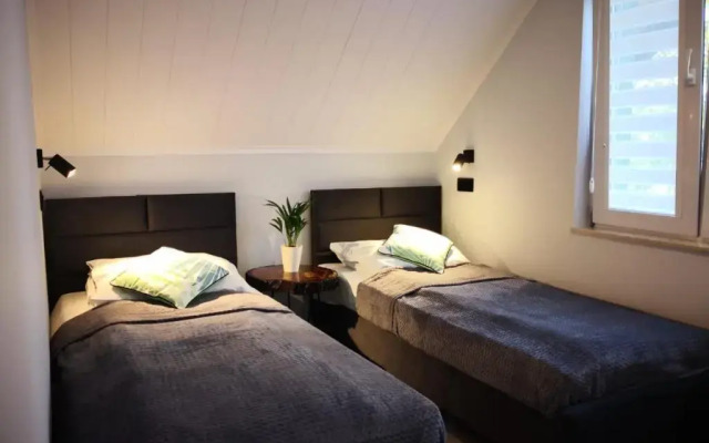 Apartamenty Gajówka- rowery, plac zabaw, sauna, jacuzzi