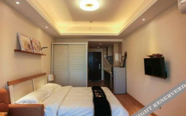 Xinyueju Boutique Apartment (Shishi Clothing City Shimao Skyscraper City Branch)