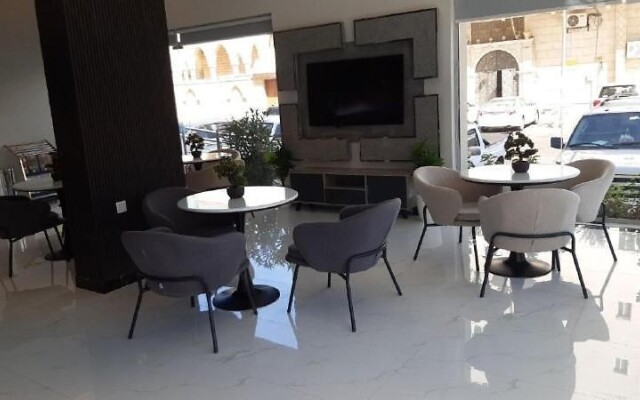 Al-Mawasem Al-Arbaa Hotel Suites