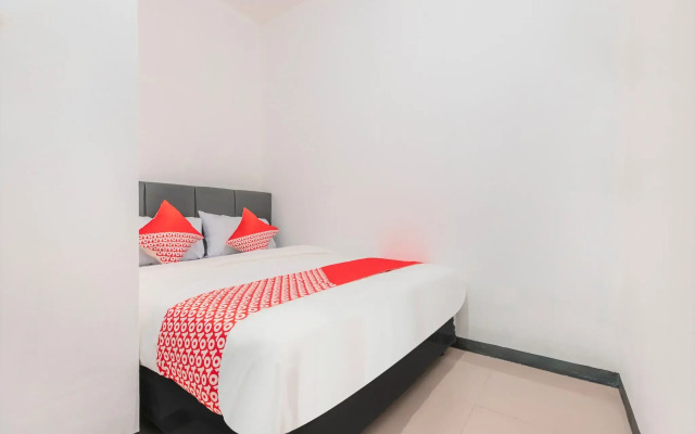 Super OYO 2223 J&b Room Utan Kayu