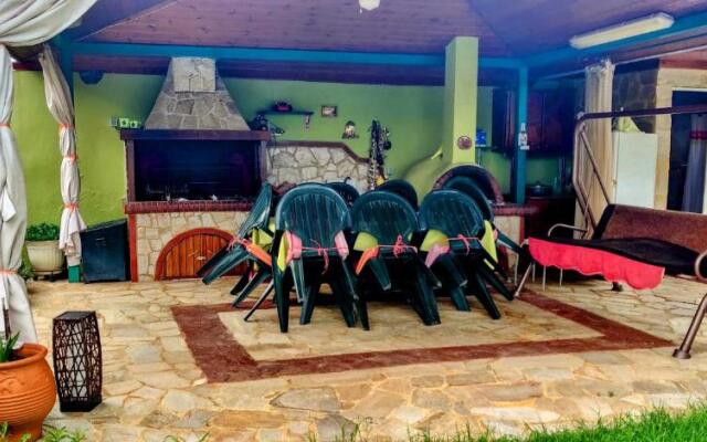 Ikos Olympus - Elegant wooden cabin house near the beach