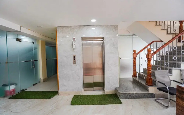 Fabhotel Ada Residency