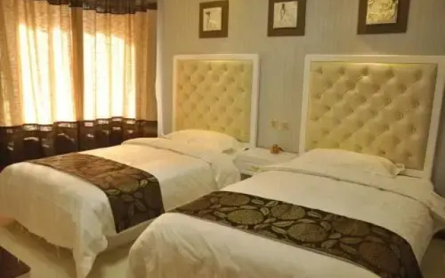 Huazhong Theme Apartment Hotel