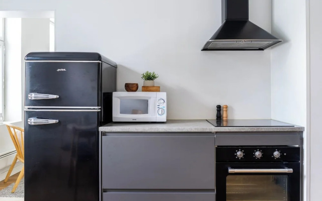 A bright wooden studio for four