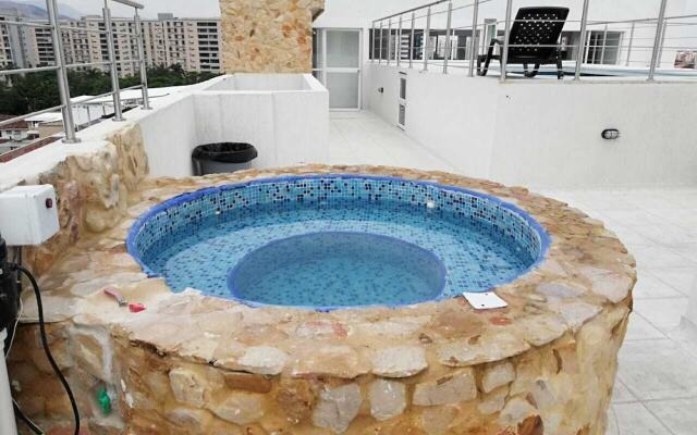 Apartasuites La Flora