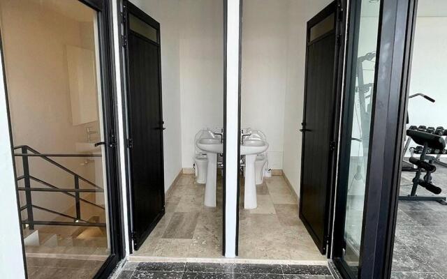 Fresh and Stylish Studio Aldea Zama rooftop pool Mya 109