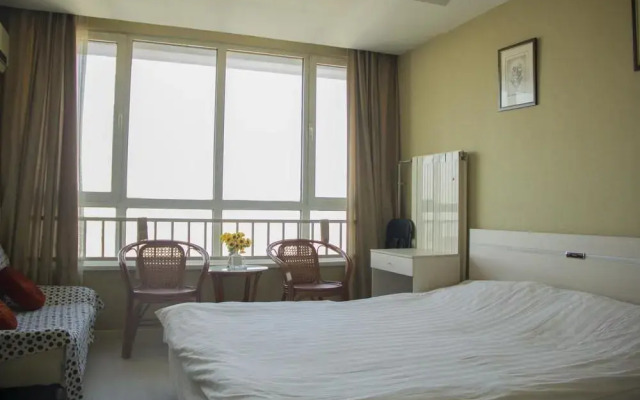 Qingdao Noah Tourist Apartment (CBD Wanda Plaza)
