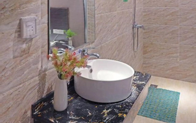 Xingyi Chain Hotel Jiangxia Metro Station
