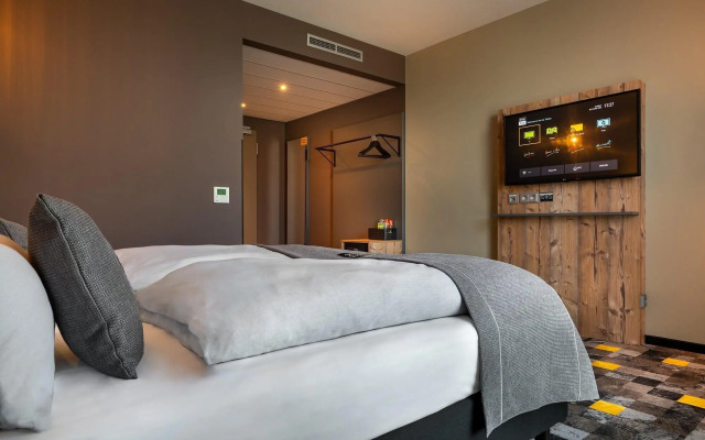 Отель Holiday Inn - the niu, Timber Esslingen, an IHG Hotel