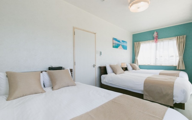 Sea Sunset Villa – Guest Rooms – Motobu