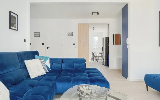 Wroclaw Dark Blue Apartment by Renters