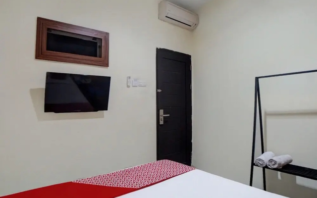 Capital O 92125 Wira Guest House